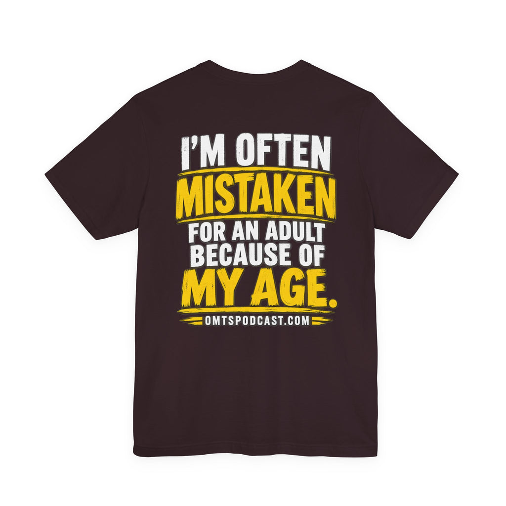 Funny Age Quote Tee — “I’m Often Mistaken for an Adult Because of My Age” Cotton T‑Shirt